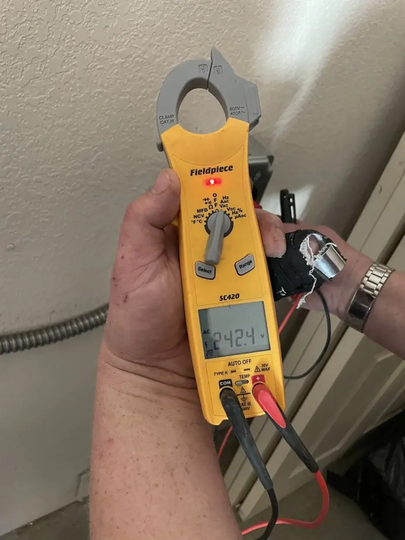 Voltage testing with clamp meter during Circuit Breaker Repair in Williston